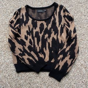 Shimmery black and gold animal print sweater